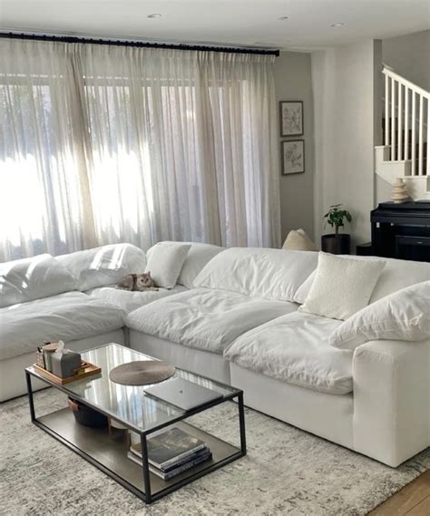 celebrity homes with cloud couch dupes.